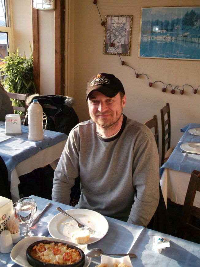 Ferda is making funny faces across from me.